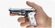 Beretta 92 Pistol miniature model, damask steel, gold-plated with pearl in hand