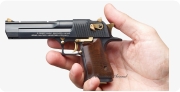 Magnum Desert Eagle Pistol miniature model in hand